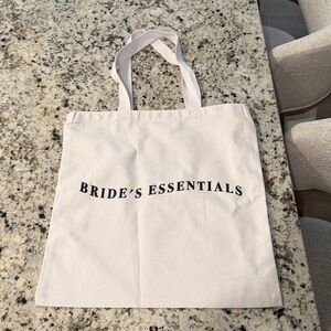 Essentials Cream Tote Bag with Black Text